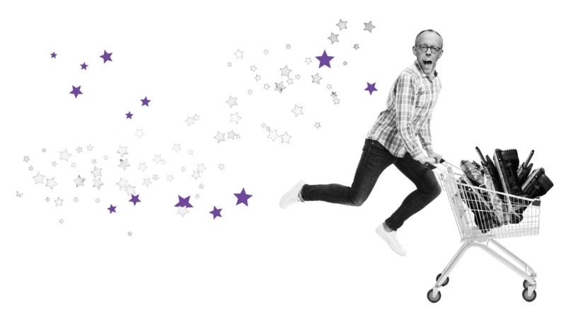 Friedrich Merz mit einem Einkaufswagen voller Panzer