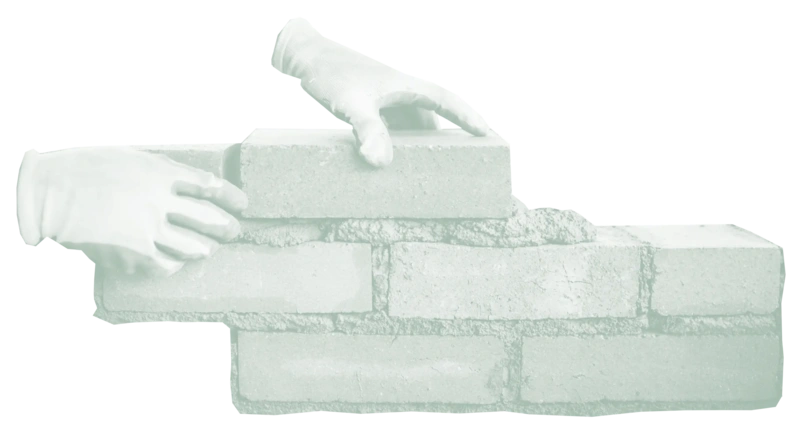 Zwei Hände mauern eine Mauer