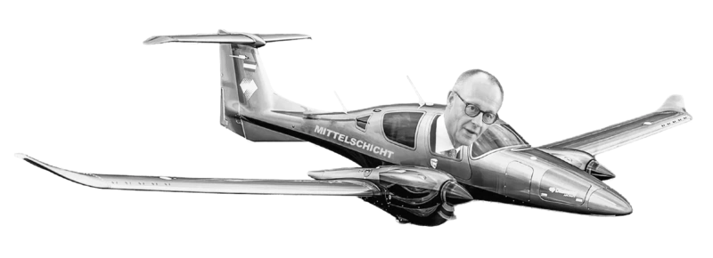 Friedrich Merz in einem Flugzeug mit Aufschrift "Mittelschicht"